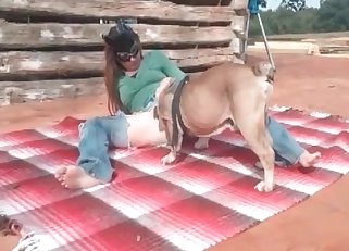 Denim-clad masked hottie fucks a dog